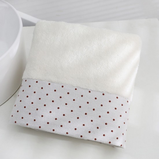 Factory direct sale of 32-strand polka dot wide forged adult bath towels, 70*140, eco-friendly and skin-friendly for hotels.