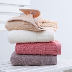 Soft, 130g, combed cotton, absorbent, and quick-drying hotel towels with embroidered logos.