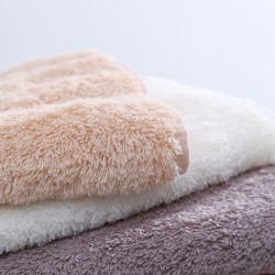 Soft, 130g, combed cotton, absorbent, and quick-drying hotel towels with embroidered logos.