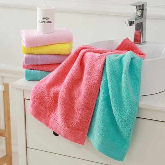 Factory direct sale, solid color cotton towels with embroidered logo.