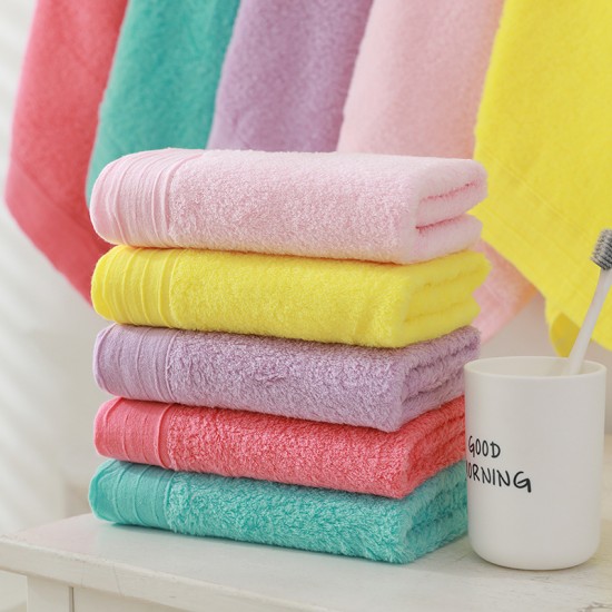 Factory direct sale, solid color cotton towels with embroidered logo.
