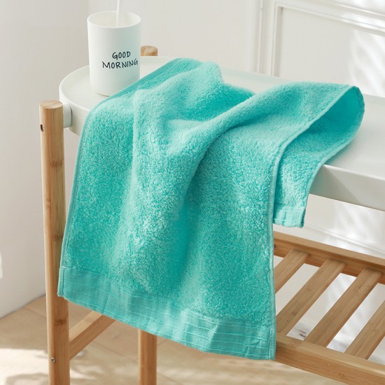 Factory direct sale, solid color cotton towels with embroidered logo.