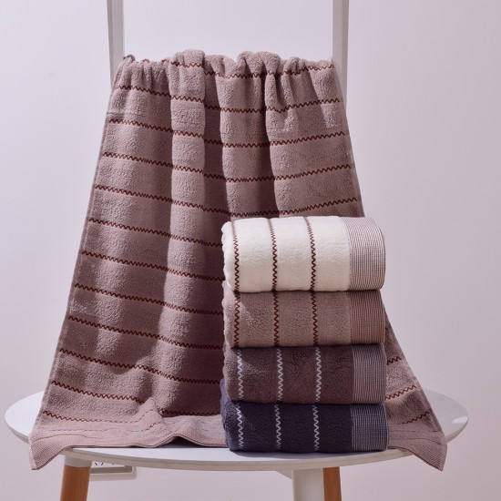 Factory wholesale of wavy cotton bath towels, soft, absorbent, and thickened, custom logo for corporate gifts.