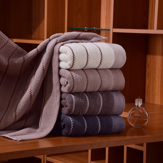 Factory wholesale of wavy cotton bath towels, soft, absorbent, and thickened, custom logo for corporate gifts.