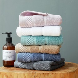 Pure cotton towels for adults, customizable in style, size, and color, with embroidered logos, available upon request.