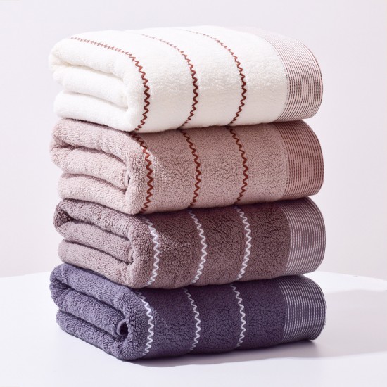 Factory wholesale of wavy cotton bath towels, soft, absorbent, and thickened, custom logo for corporate gifts.